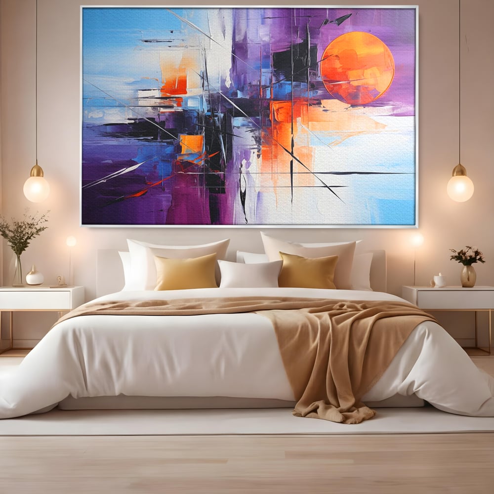Tablou canvas cu pictura abstracta cu soare portocaliu, in rama de aluminiu argintiu, pe perete intr-un dormitor